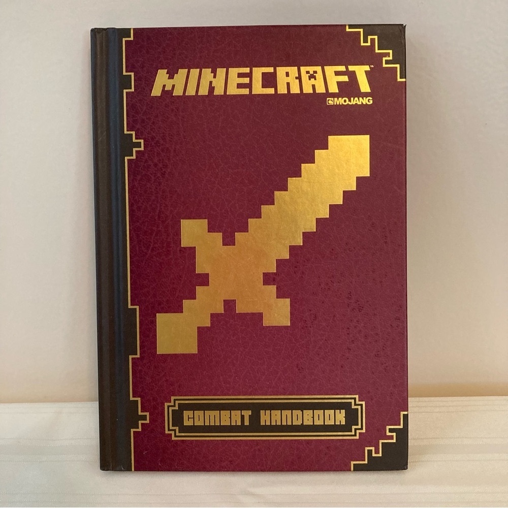 Minecraft Combat Handbook Hardcover by Mojang 2014